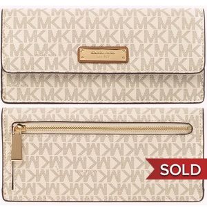 SOLD Michael Kors Clutch Wallet “Money Pieces”